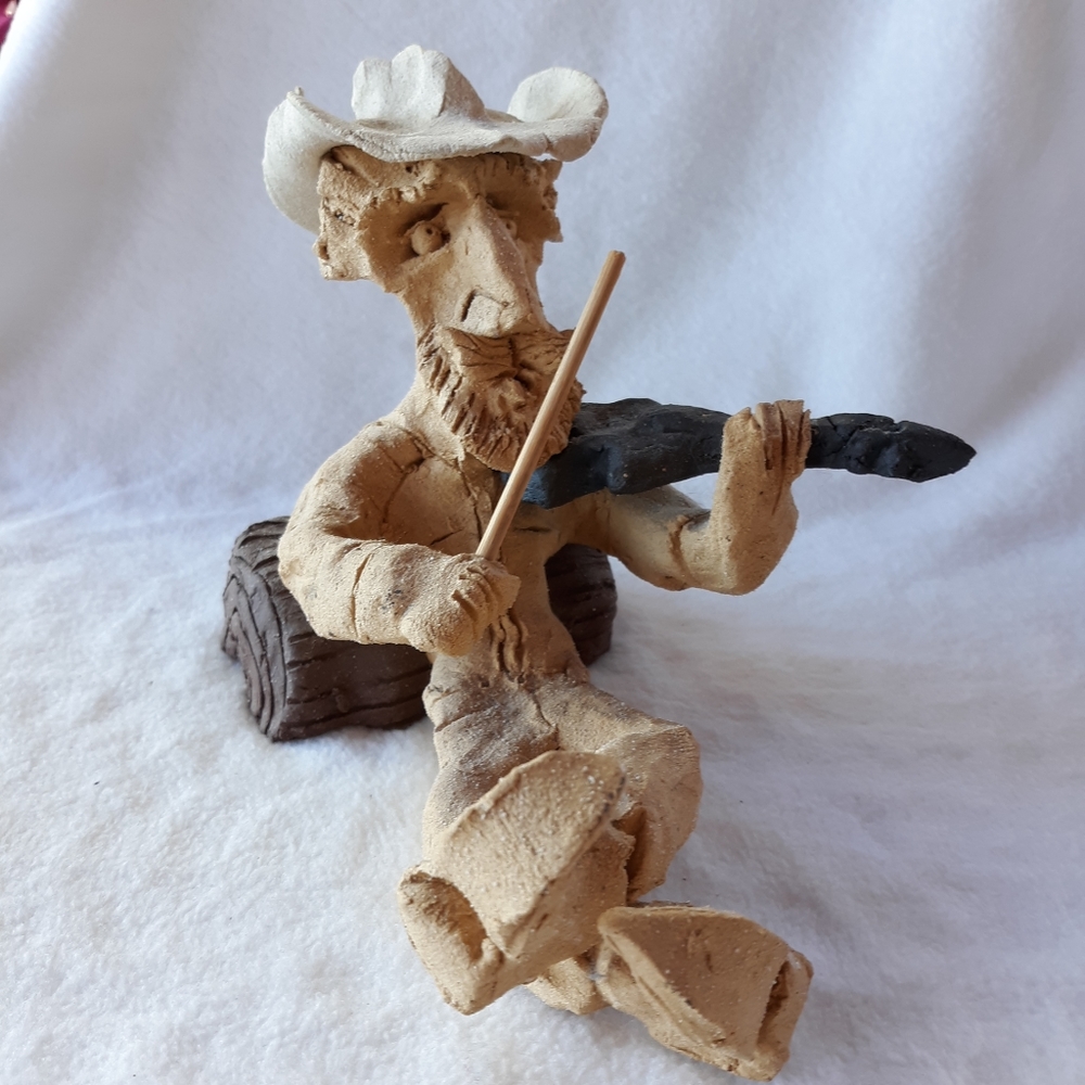 Artisan Clay Art figure of Cowboy Playing a fiddle